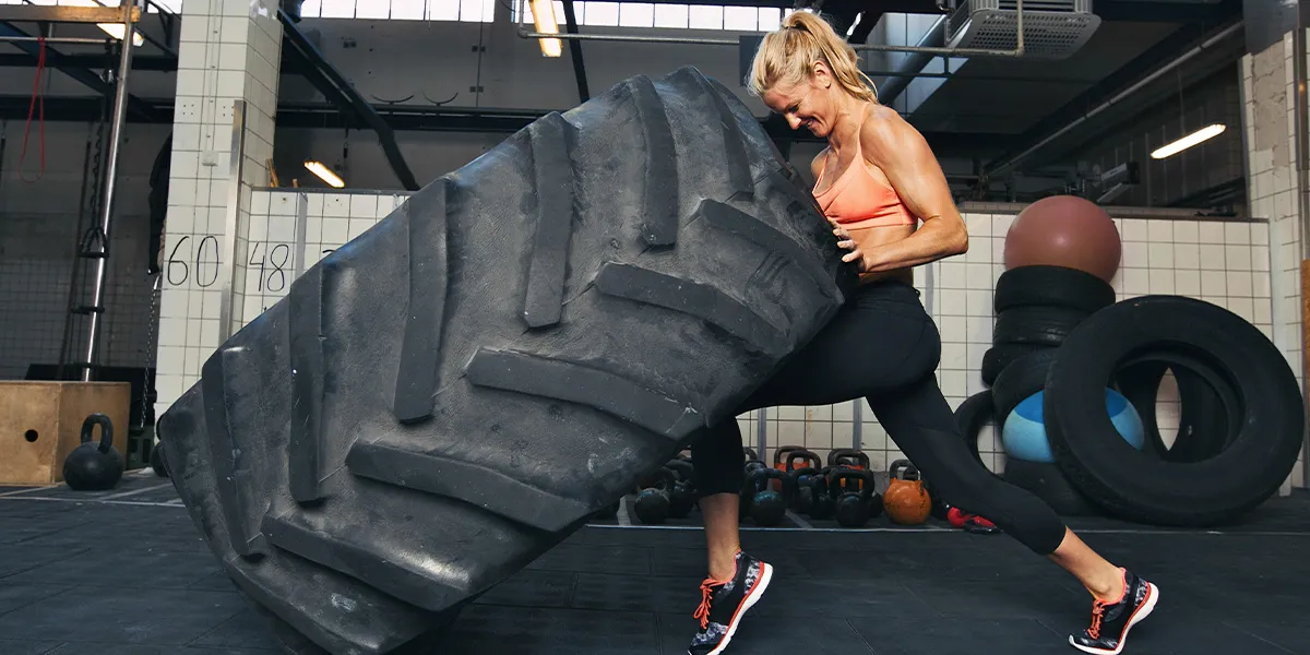 Woman flipping tire