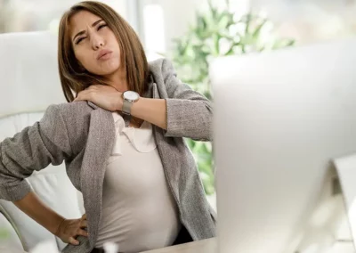 How Can Office Workers (aka Desk Sitters) Minimize Back Pain at Work?
